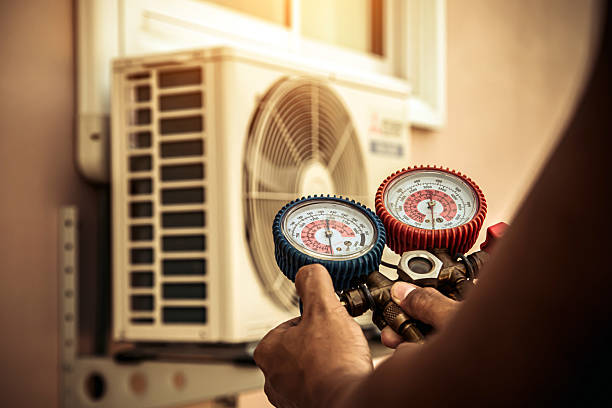 Professional Heat Pump Repair technician working in Center, TX